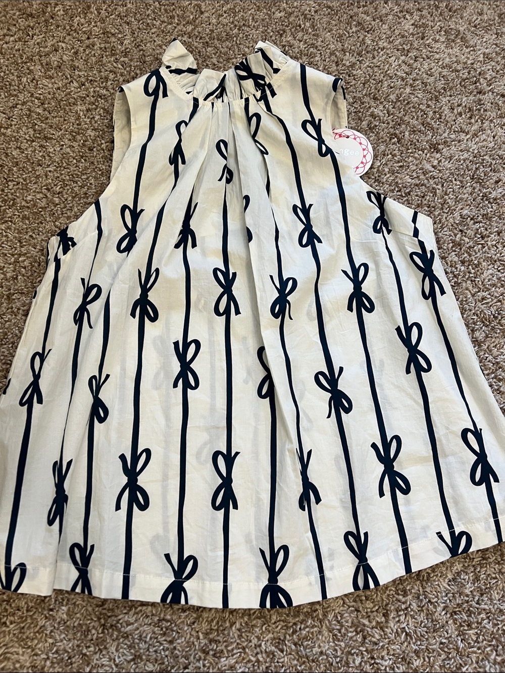 Umgee Sleeveless Cream Top with Navy Bow Stripe Print